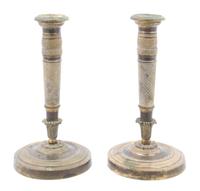 A Pair of Empire Gilt Bronze Candlesticks Height 8 1/4 inches.