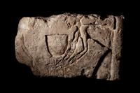 An Egyptian Limestone Relief Fragment