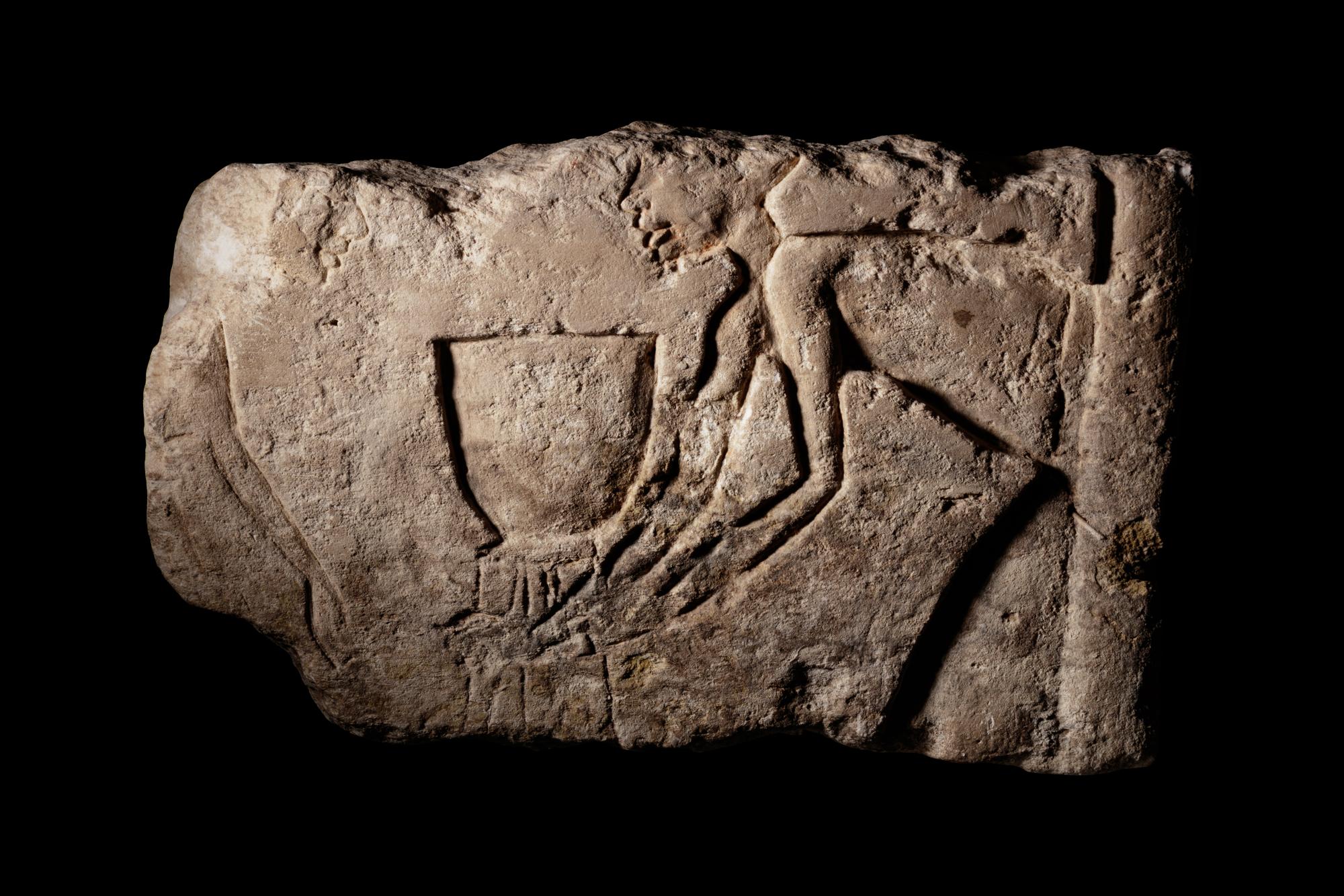 An Egyptian Limestone Relief Fragment