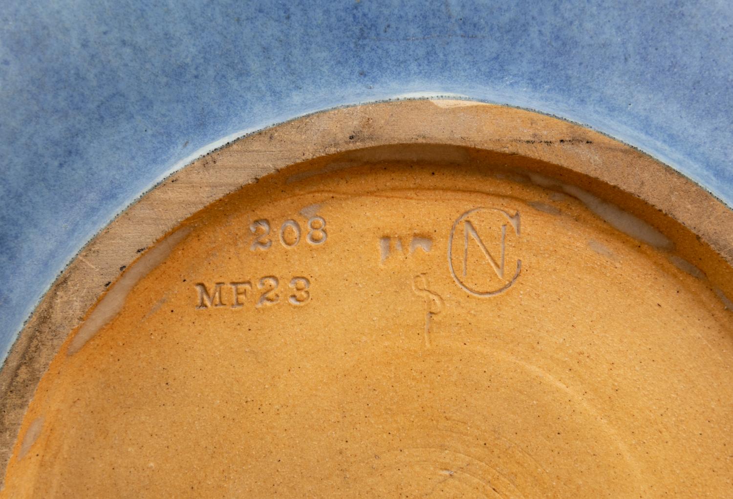 Low Bowl, c. 1922 together with an American art pottery figural flower frog