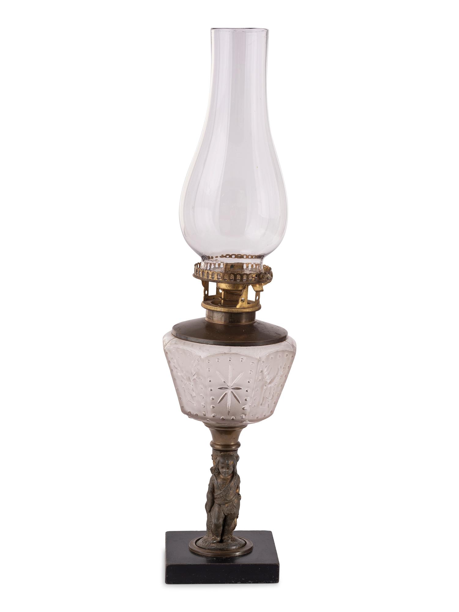Four Gilt Metal and Glass Figural Oil Lamps
