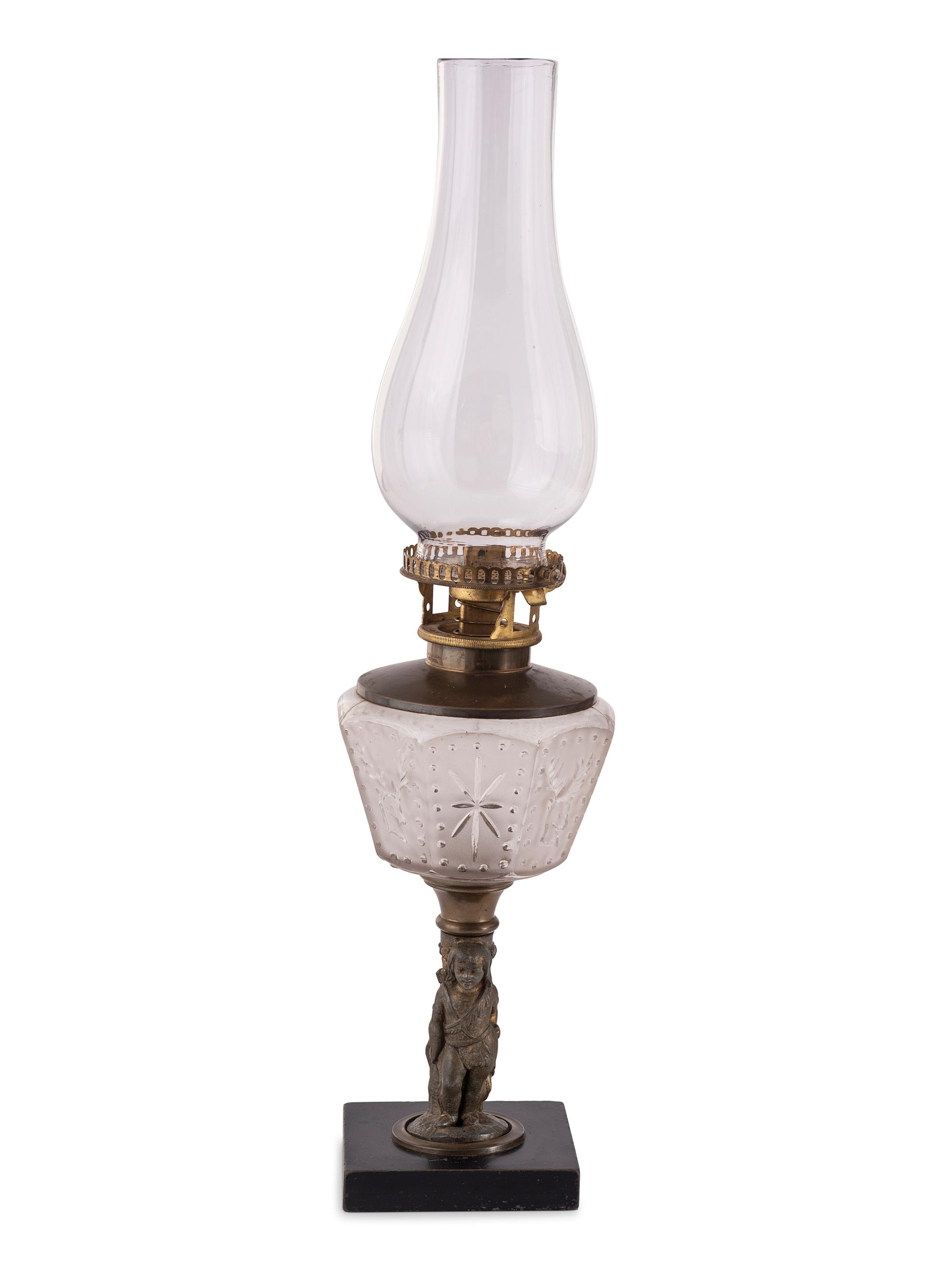 Four Gilt Metal and Glass Figural Oil Lamps