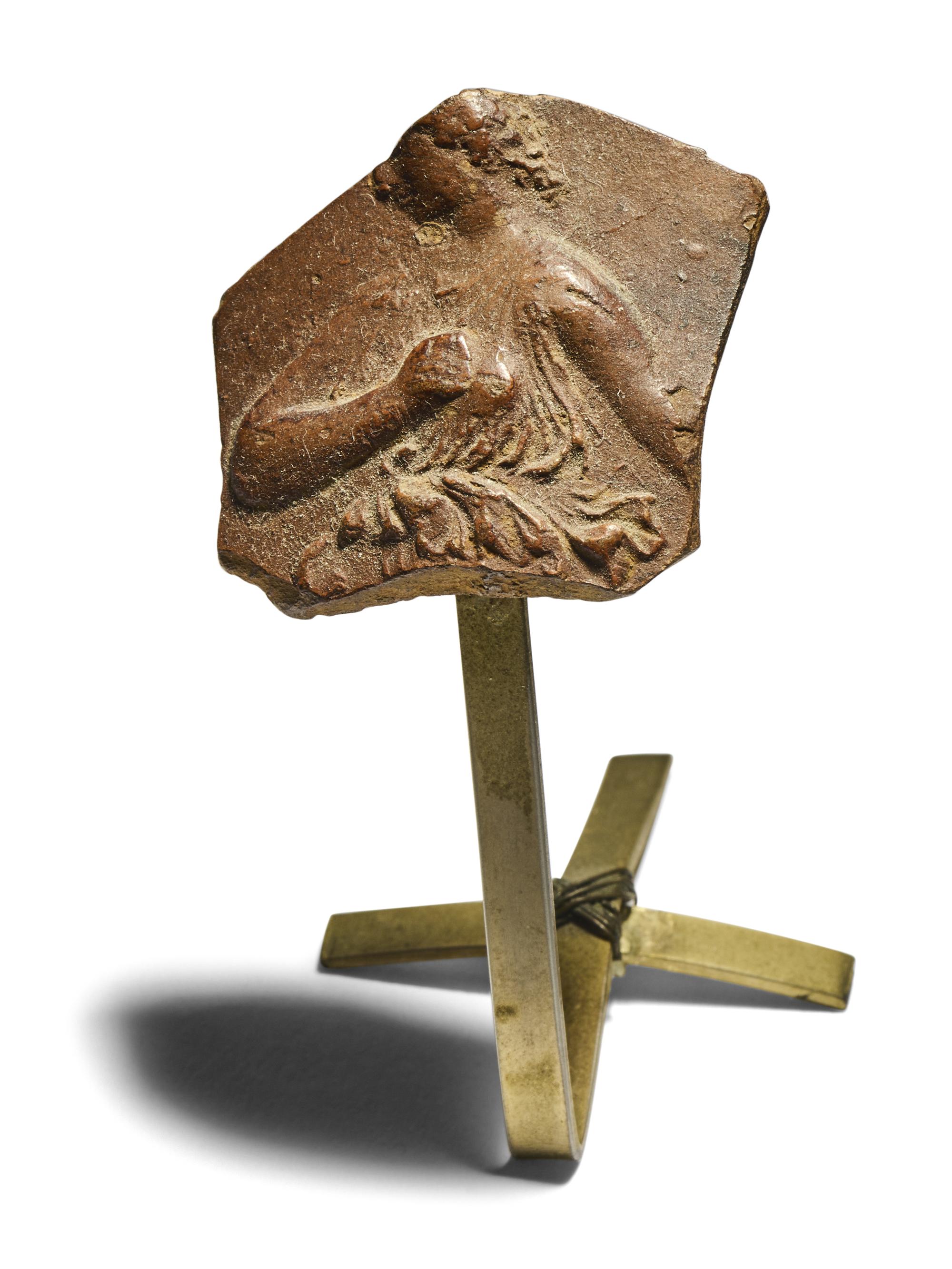 A Hellenistic Red-Ware Fragment with a Robed Woman