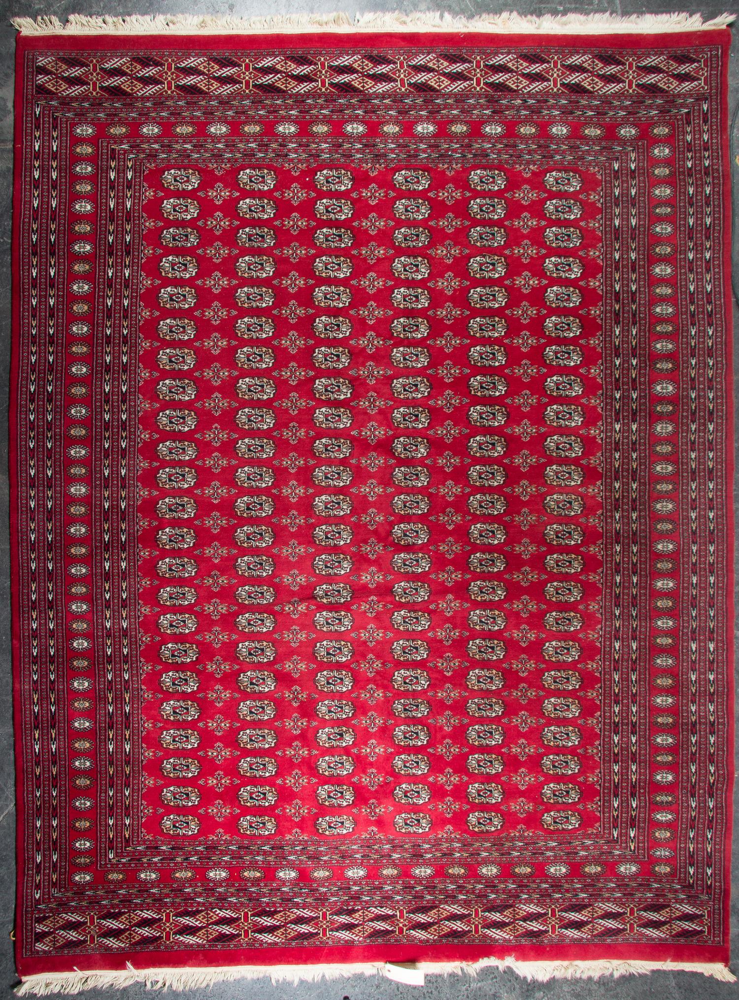 A Bokhara Wool Rug 10 feet 3 inches x 8 feet 3 inches. — SECOND HALF 20TH CENTURY
