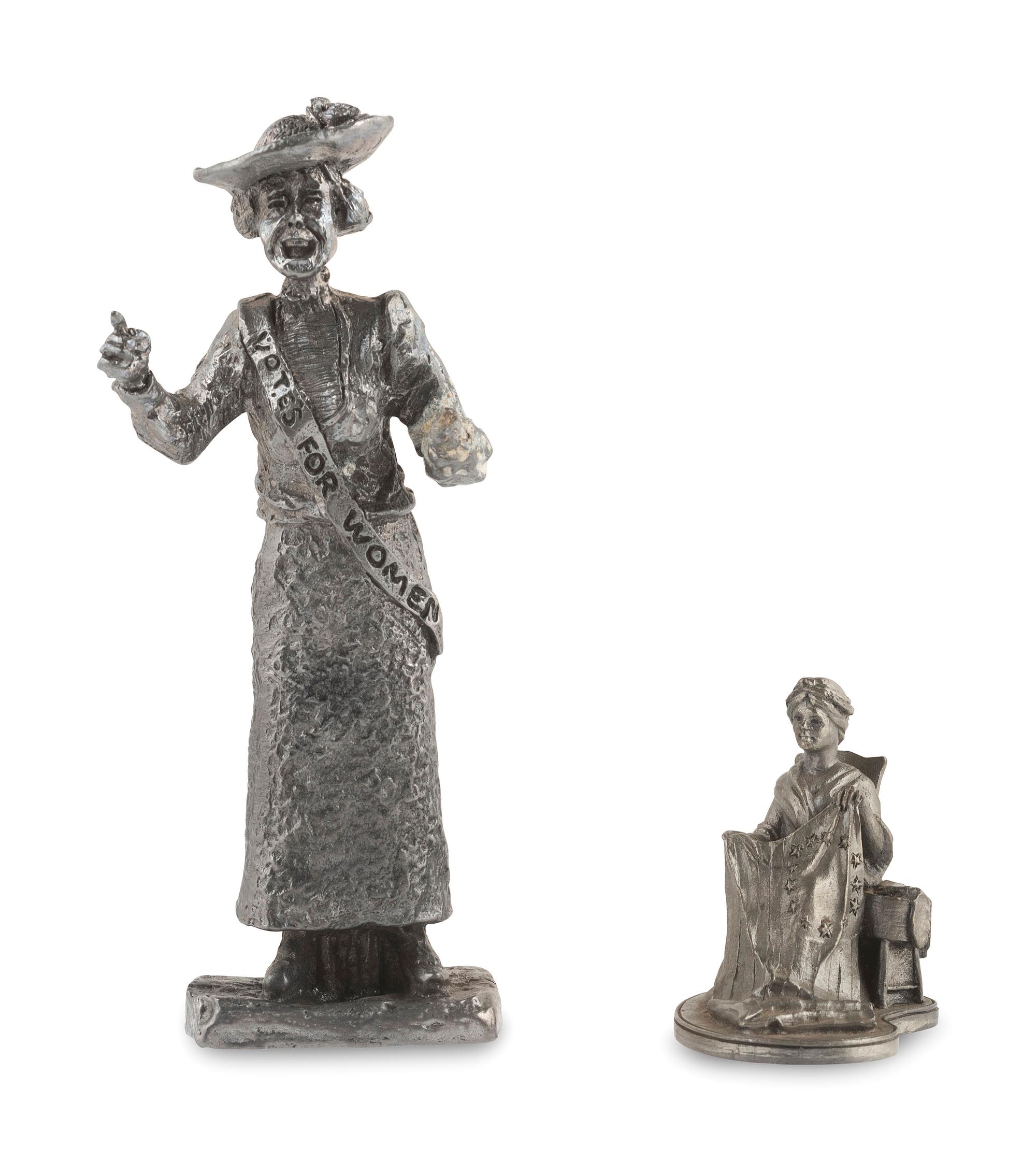 [WOMEN'S SUFFRAGE]. A collection of items belonging to women's rights activist Mariwyn Heath, incl. "Votes for Women" pennant, Veteran Feminists Medal of Honor, pinbacks, buttons, & pewter figures.
