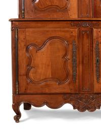 A Louis XV Provincial Cherry Stepback Cupboard