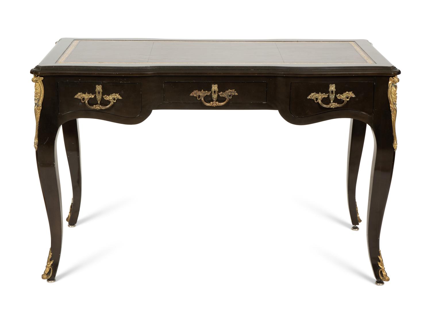 A Louis XV Style Gilt Metal-Mounted Ebonized Bureau Plat