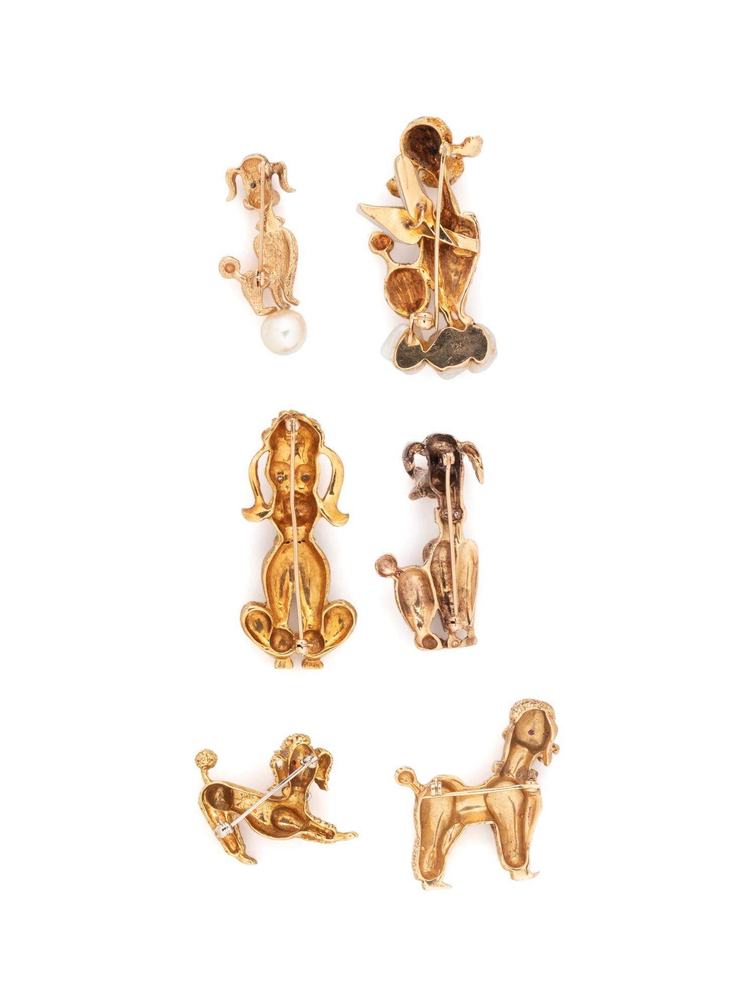 COLLECTION OF YELLOW GOLD POODLE BROOCHES