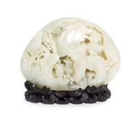 A Carved Pale Celadon Jade Boulder Height 7 x width 8 inches.