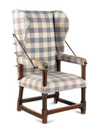 A Louis XIII Walnut and Iron Mounted Fauteuil de Malade