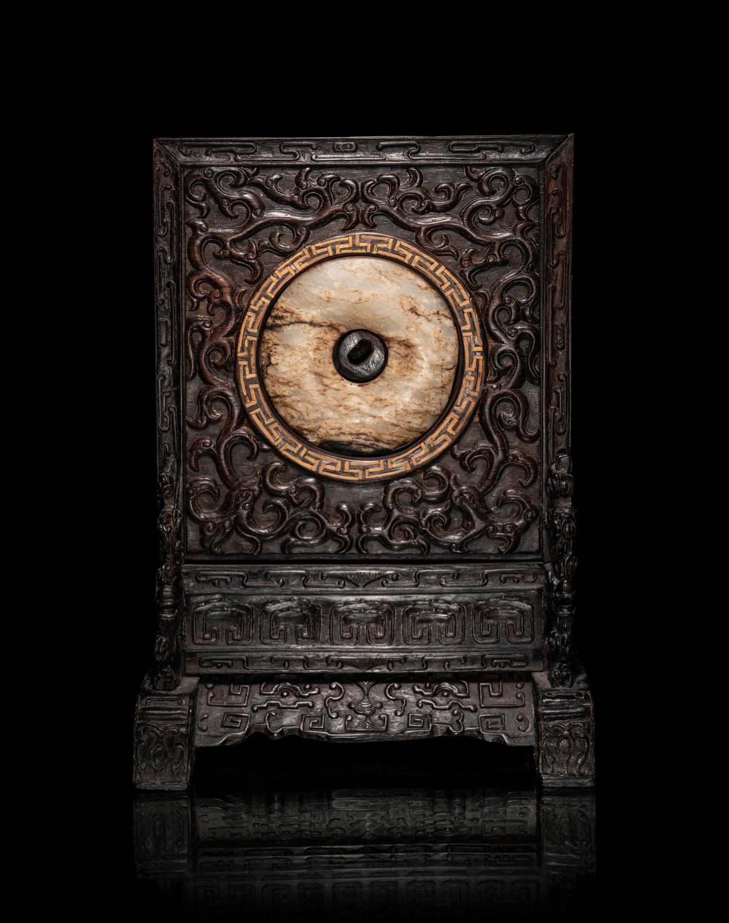 A Chinese Jade Bi Disc Inset Hardwood Table Screen