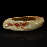 A Chinese carved russet and beige jade "Lotus Leaf" brush washer 赤褐色沁灰玉莲叶水洗