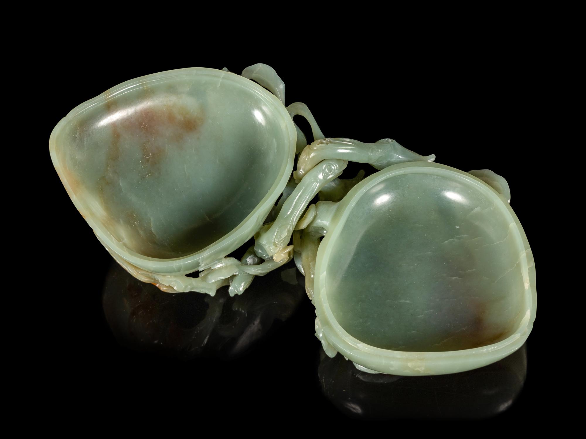 A Russet and Celadon Jade 'Peach and Bat' Covered Box