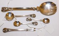 A Group of Five American Silver Serving Articles, Georg Jensen USA, Inc., New York, NY, comprising two coffee spoons, a bonbon spoon, a
