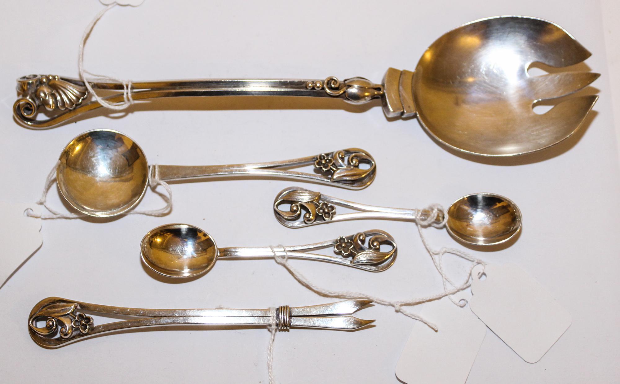 A Group of Five American Silver Serving Articles, Georg Jensen USA, Inc., New York, NY, comprising two coffee spoons, a bonbon spoon, a