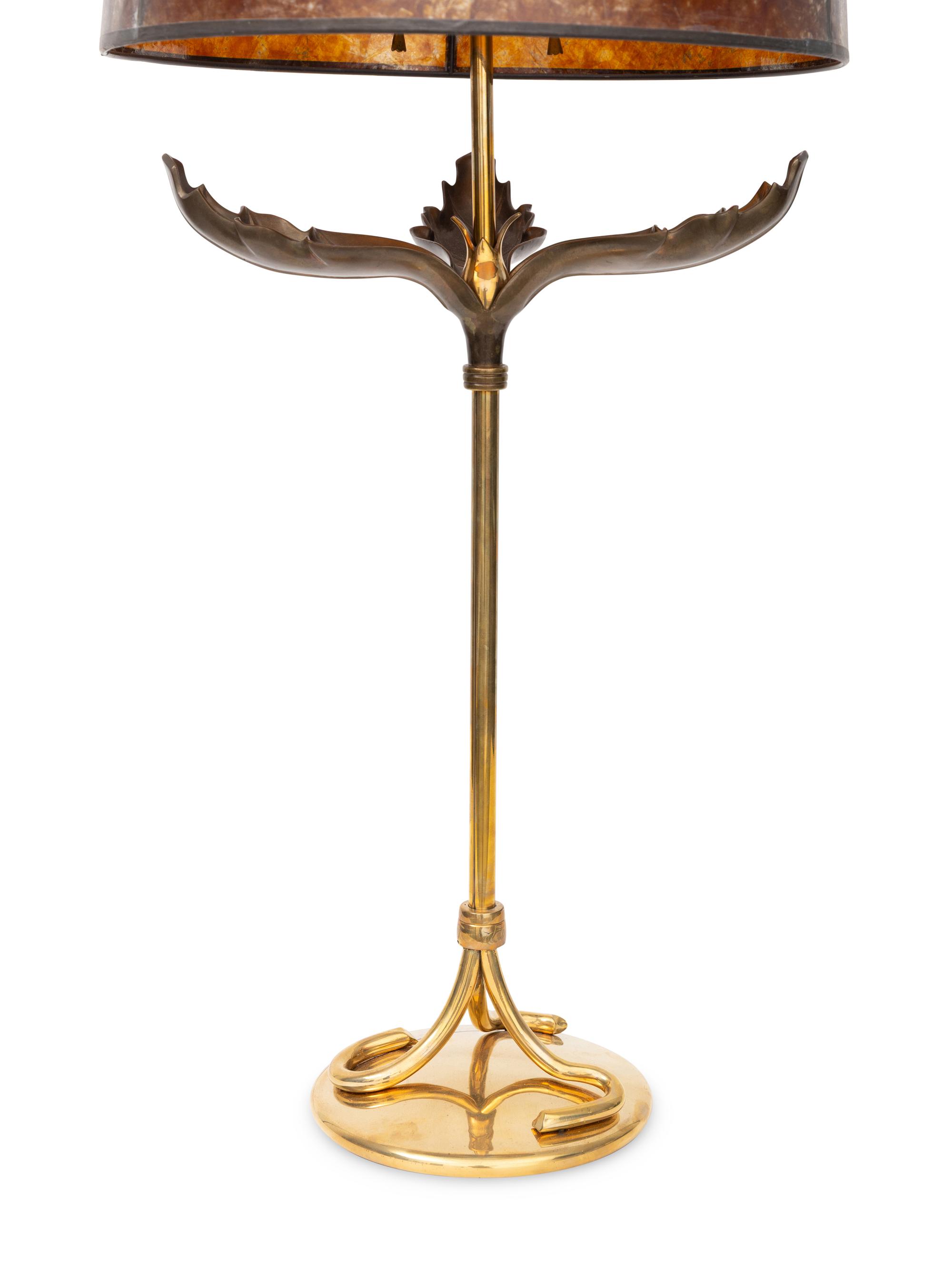 A Metal Palm Frond Table Lamp with Mica Shade