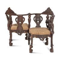 An Italian Carved Walnut Tête-à-Tête