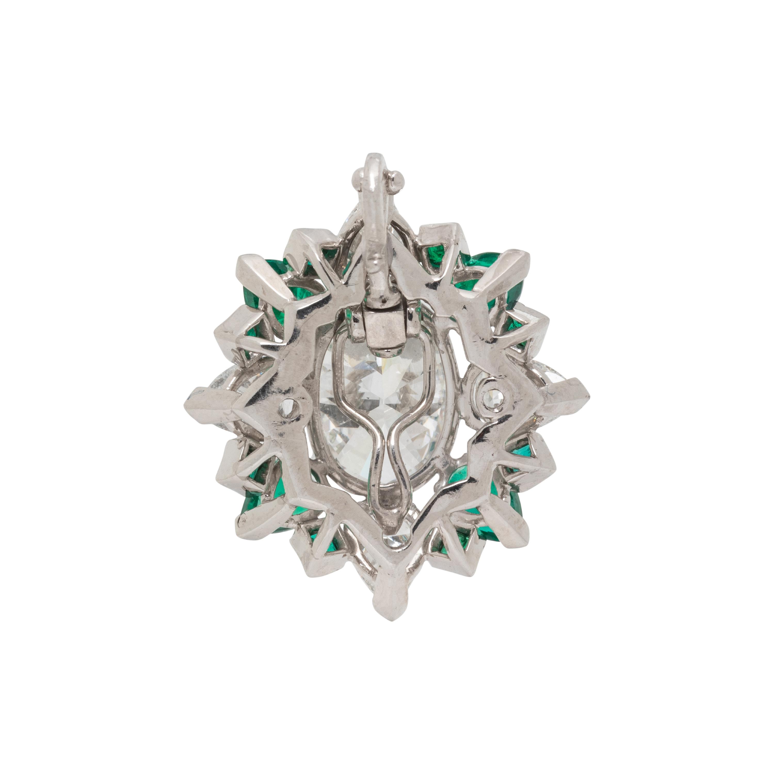 DIAMOND, EMERALD AND PLATINUM RING PENDANT