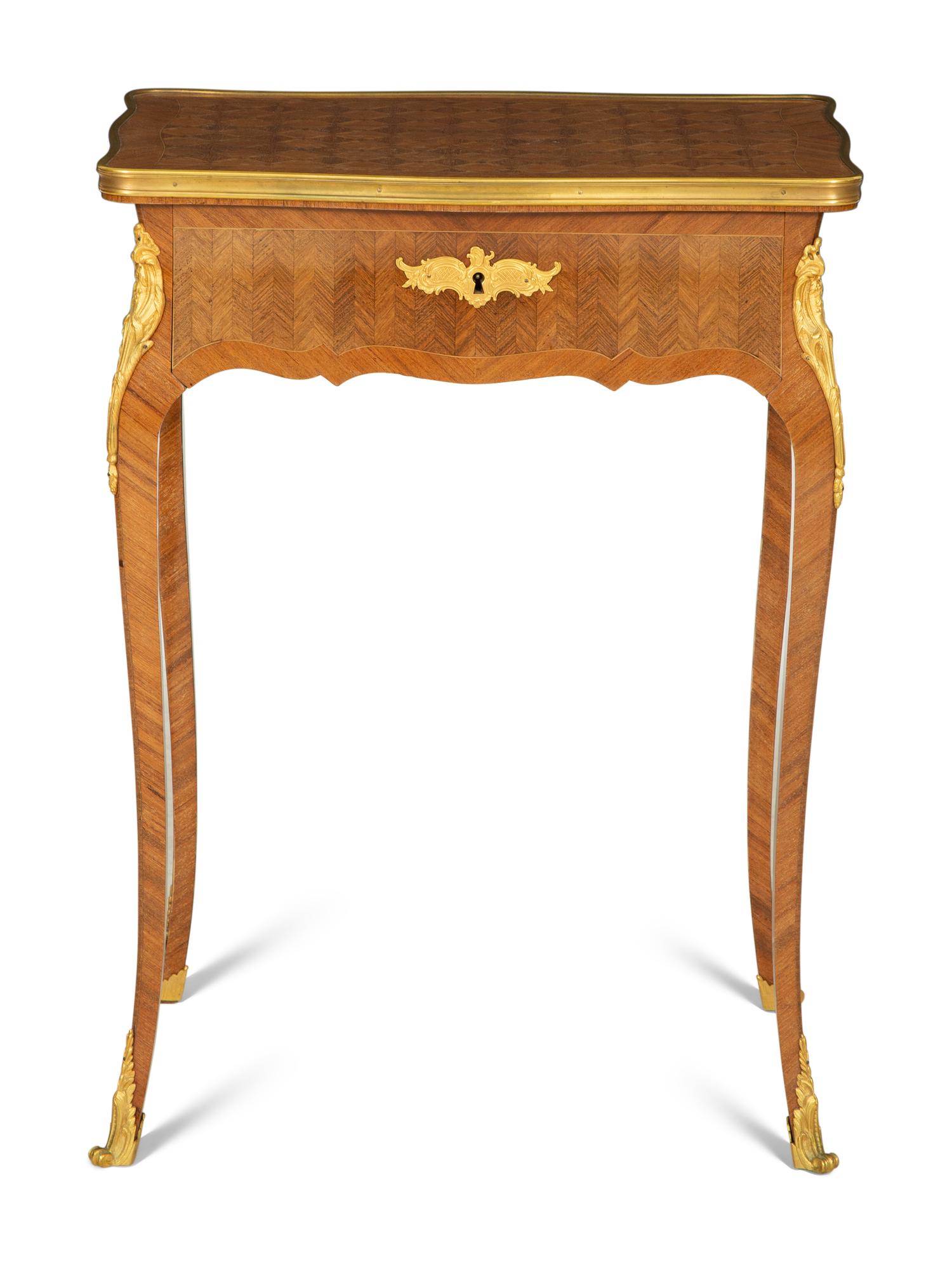 A Louis XV Style Gilt Metal Mounted Parquetry Dressing Table