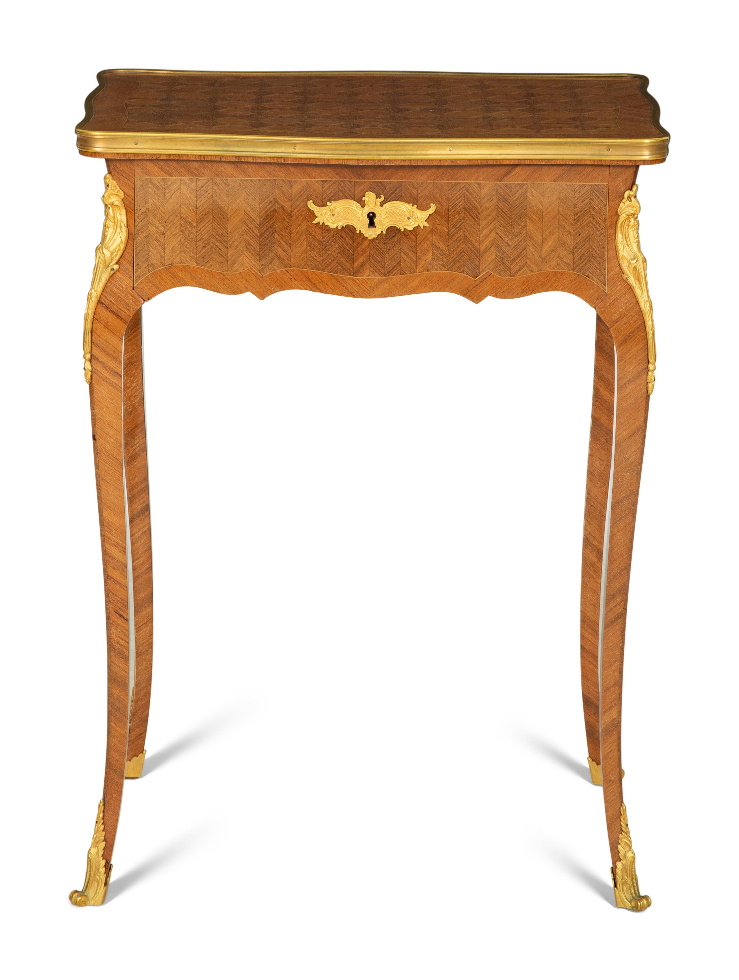 A Louis XV Style Gilt Metal Mounted Parquetry Dressing Table