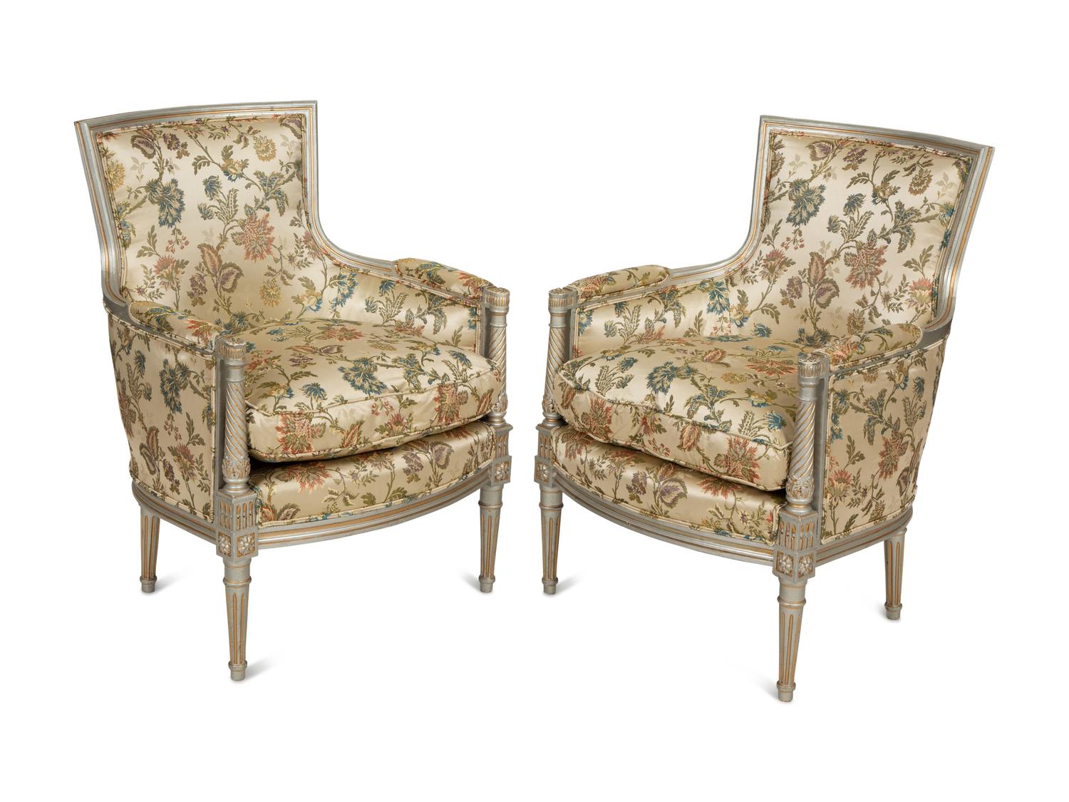 A Pair of Louis XVI Style Painted and Parcel Gilt Bergères