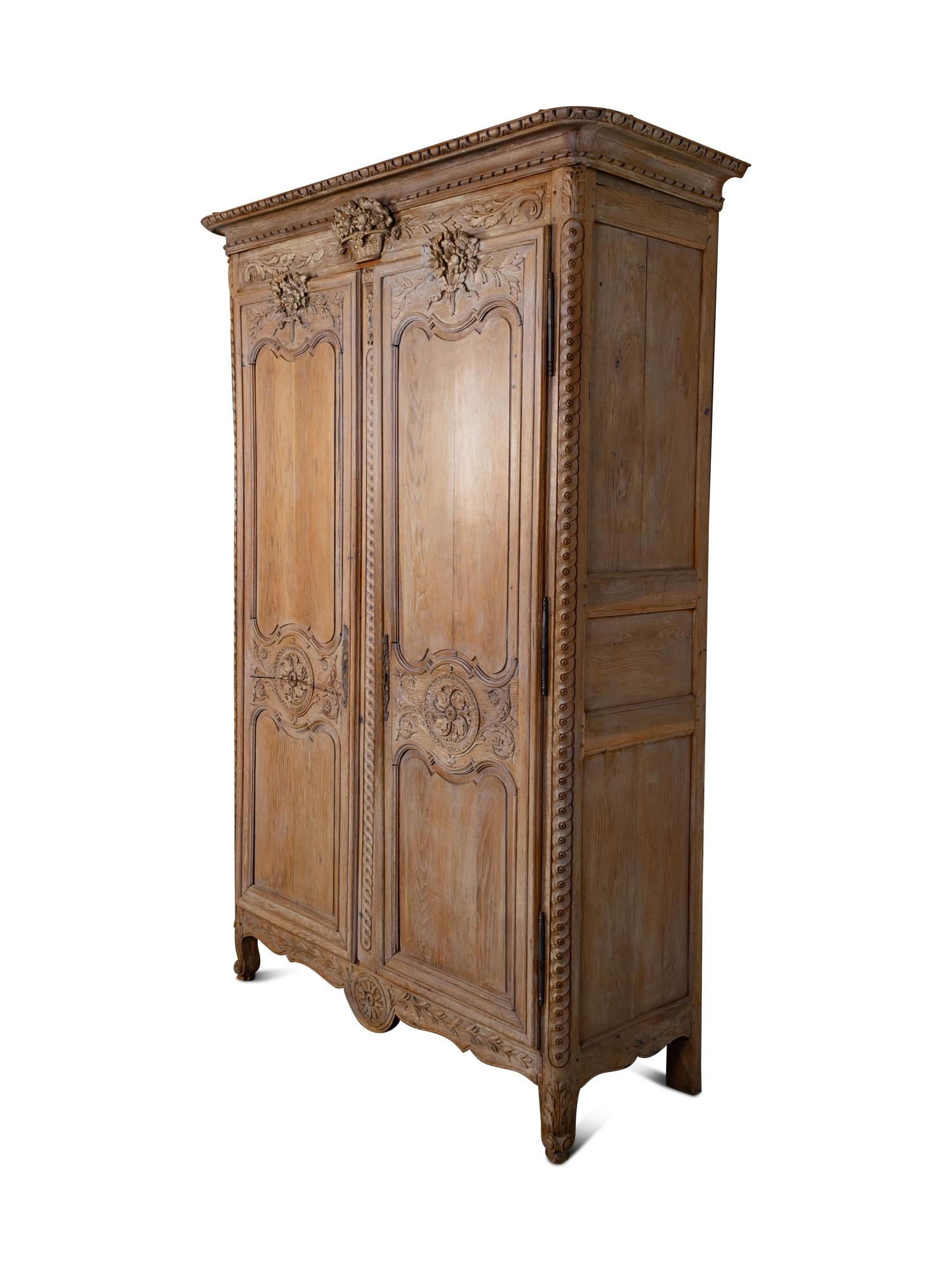 A Louis XVI Cerused Oak Armoire