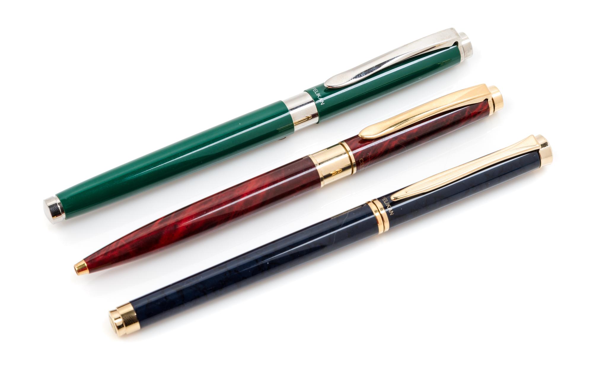 A Collection of Three Pelikan Pens Length of longest 5 1/2 inches.