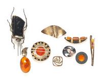 A GROUP OF NINE BROOCHES