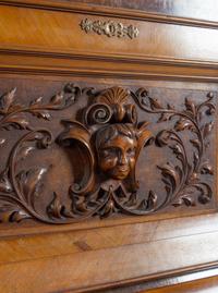A German Carved Walnut Upright Player Piano and Upholstered Bench