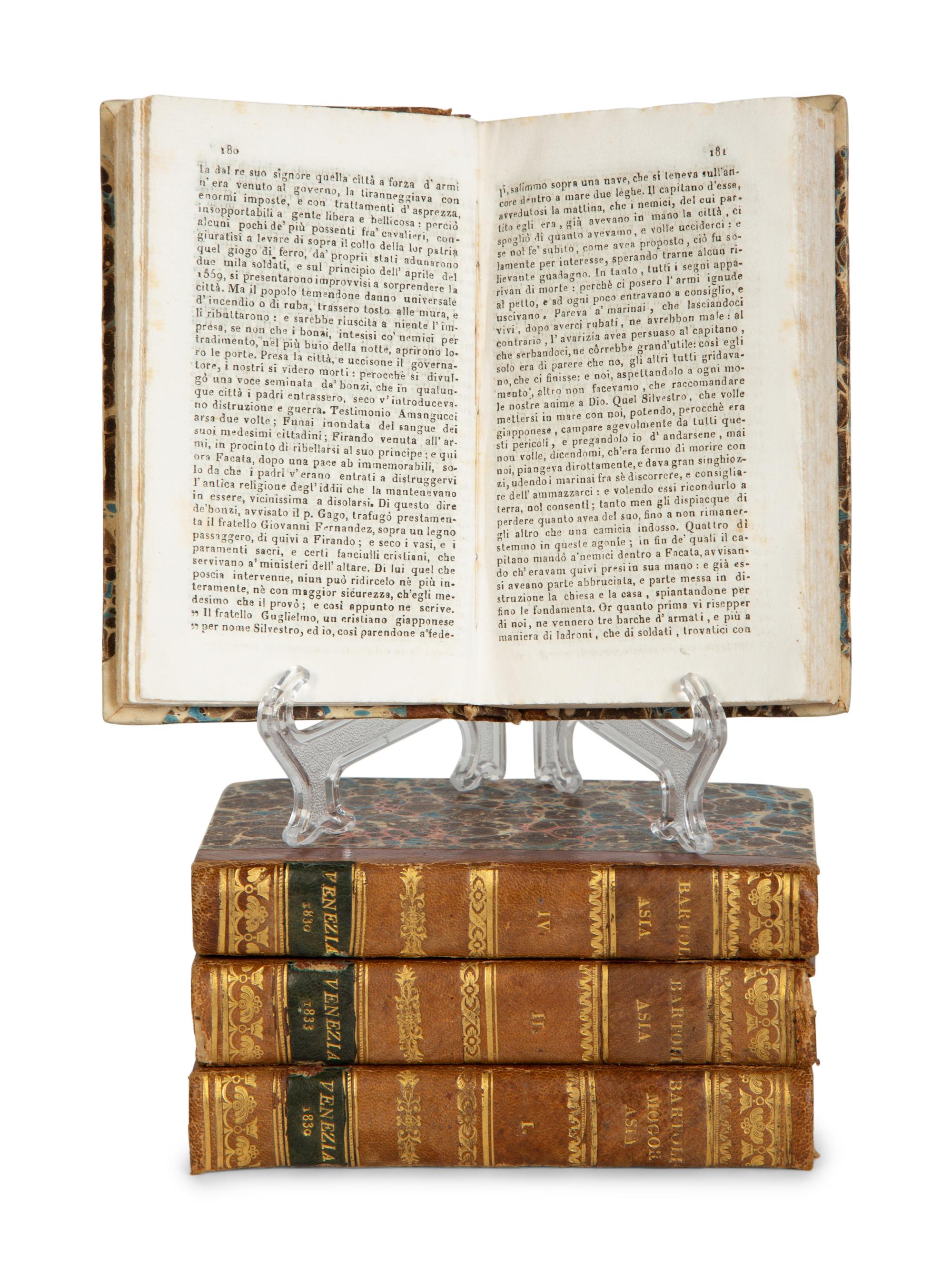 Six Gilt-Tooled Leather Books with Marbled Boards