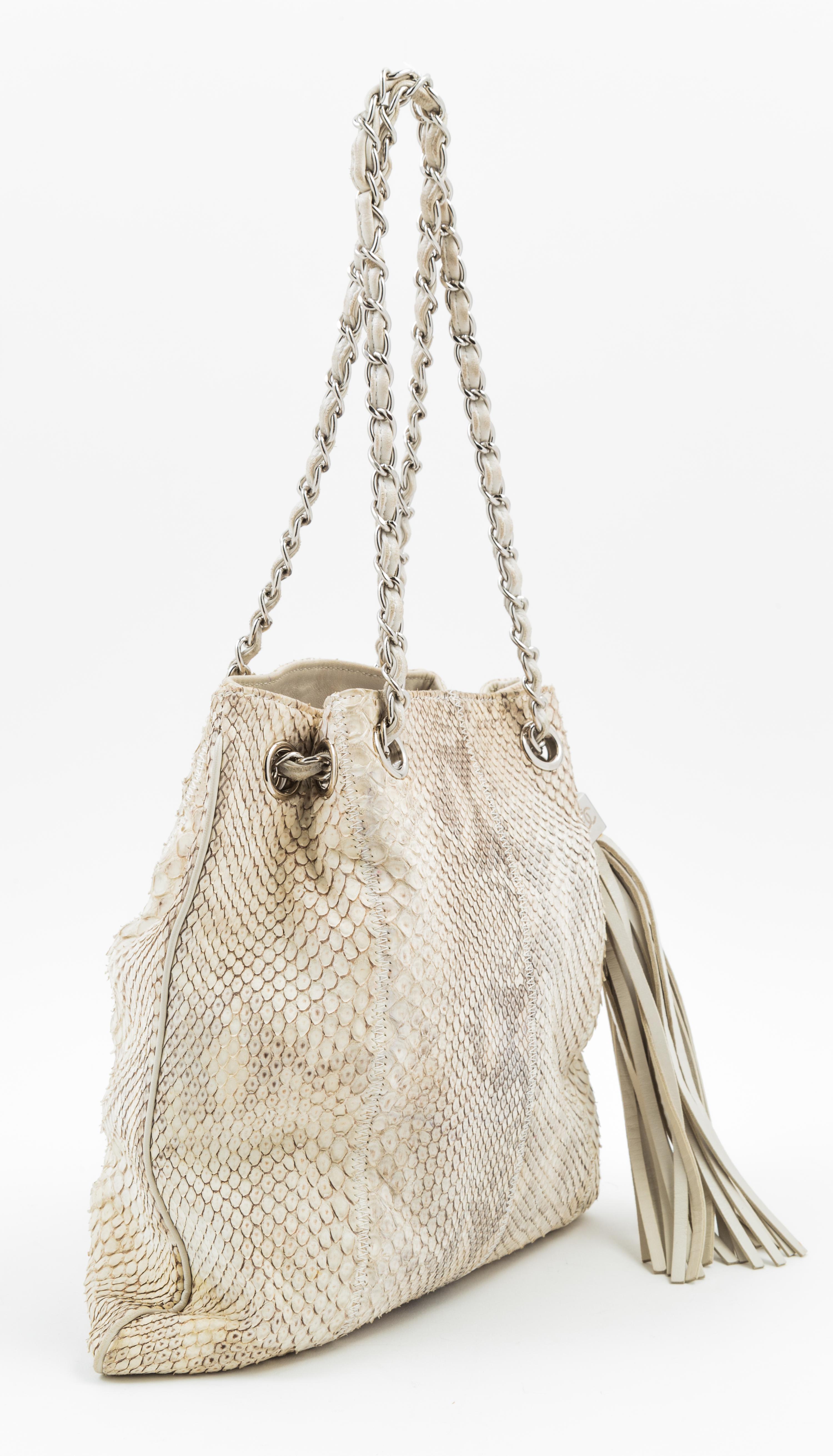 A Chanel Cream and Grey Python Drawstring Bag, 11" x 11" x .5"; Strap drop: 8".