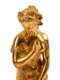 Theodore Doriot (French, 19th Century) Allegorical Figures (a pair) gilt bronze signed T. Doriot Height overall 16 inches.