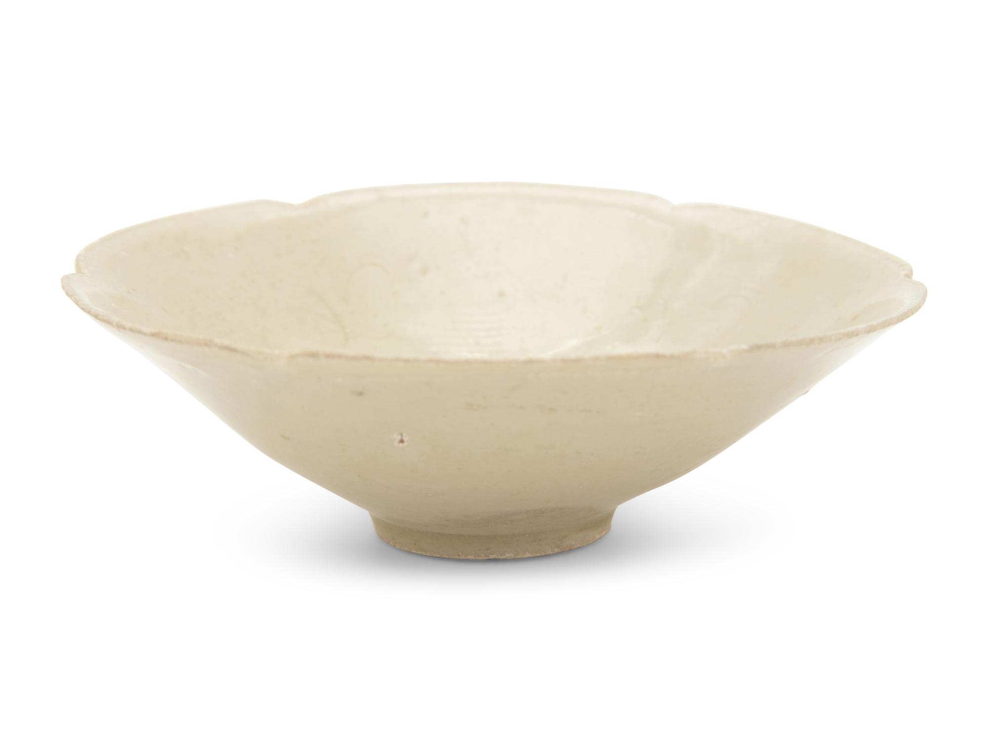 A Chinese Pale Celadon Glazed Porcelain 'Combed' Bowl