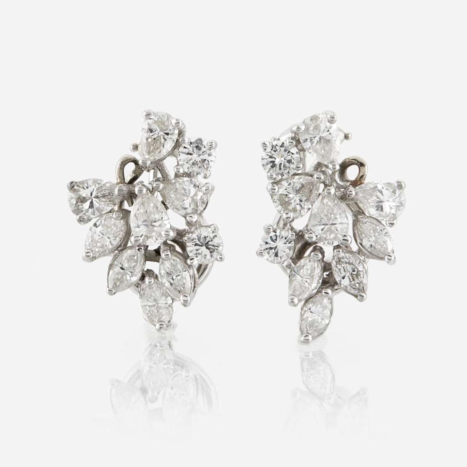A pair of diamond and platinum earrings