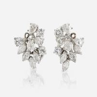 A pair of diamond and platinum earrings