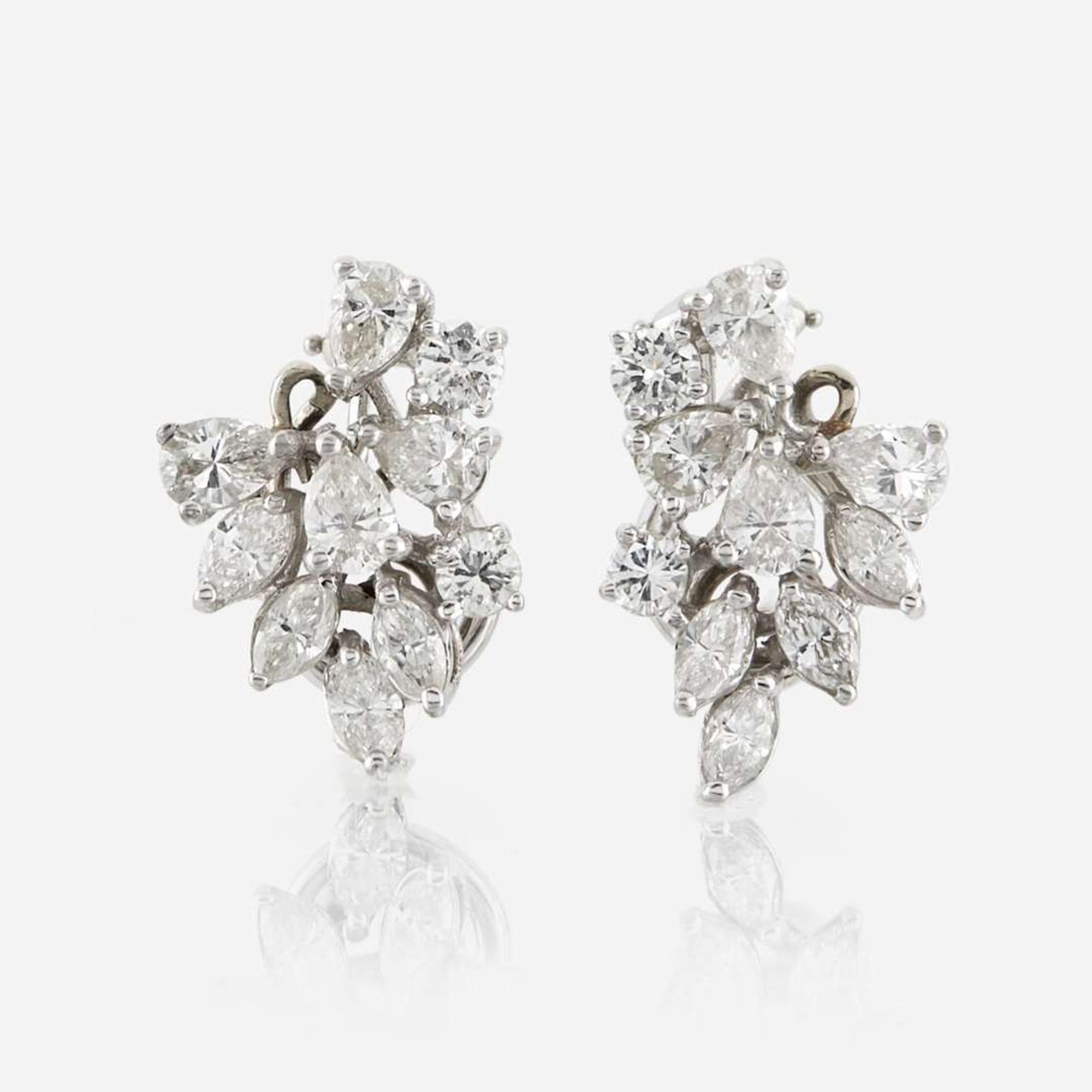 A pair of diamond and platinum earrings