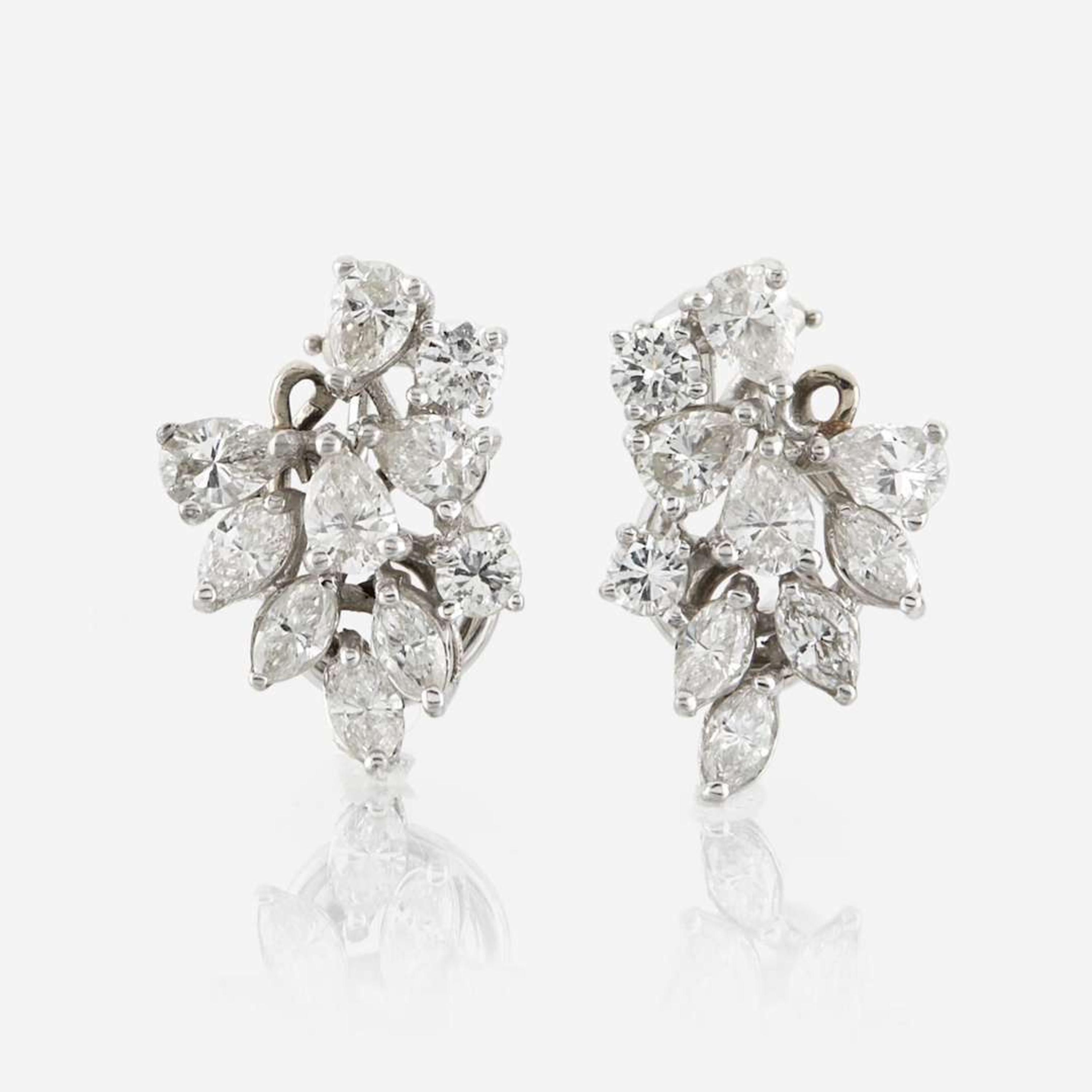 A pair of diamond and platinum earrings
