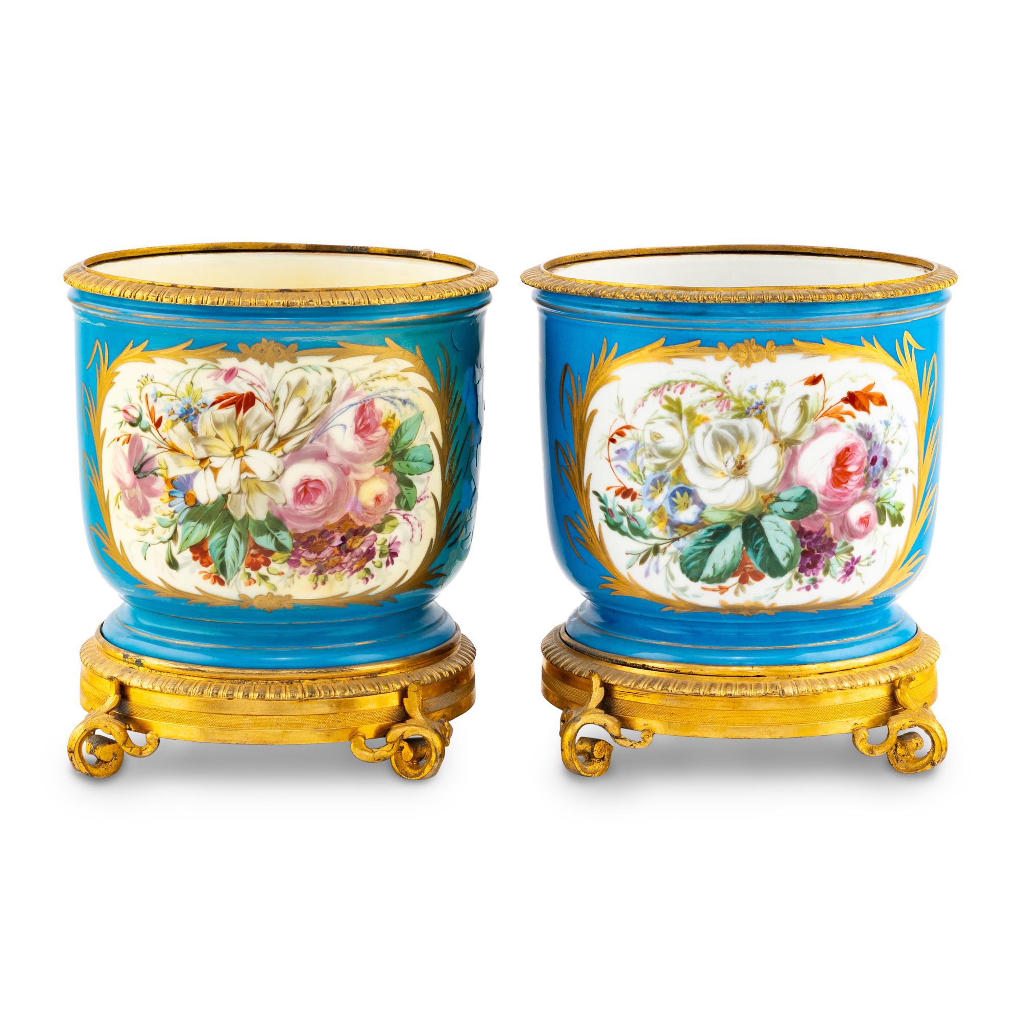 A Pair of Sèvres Style Porcelain and Gilt Bronze Mounted Cache Pots