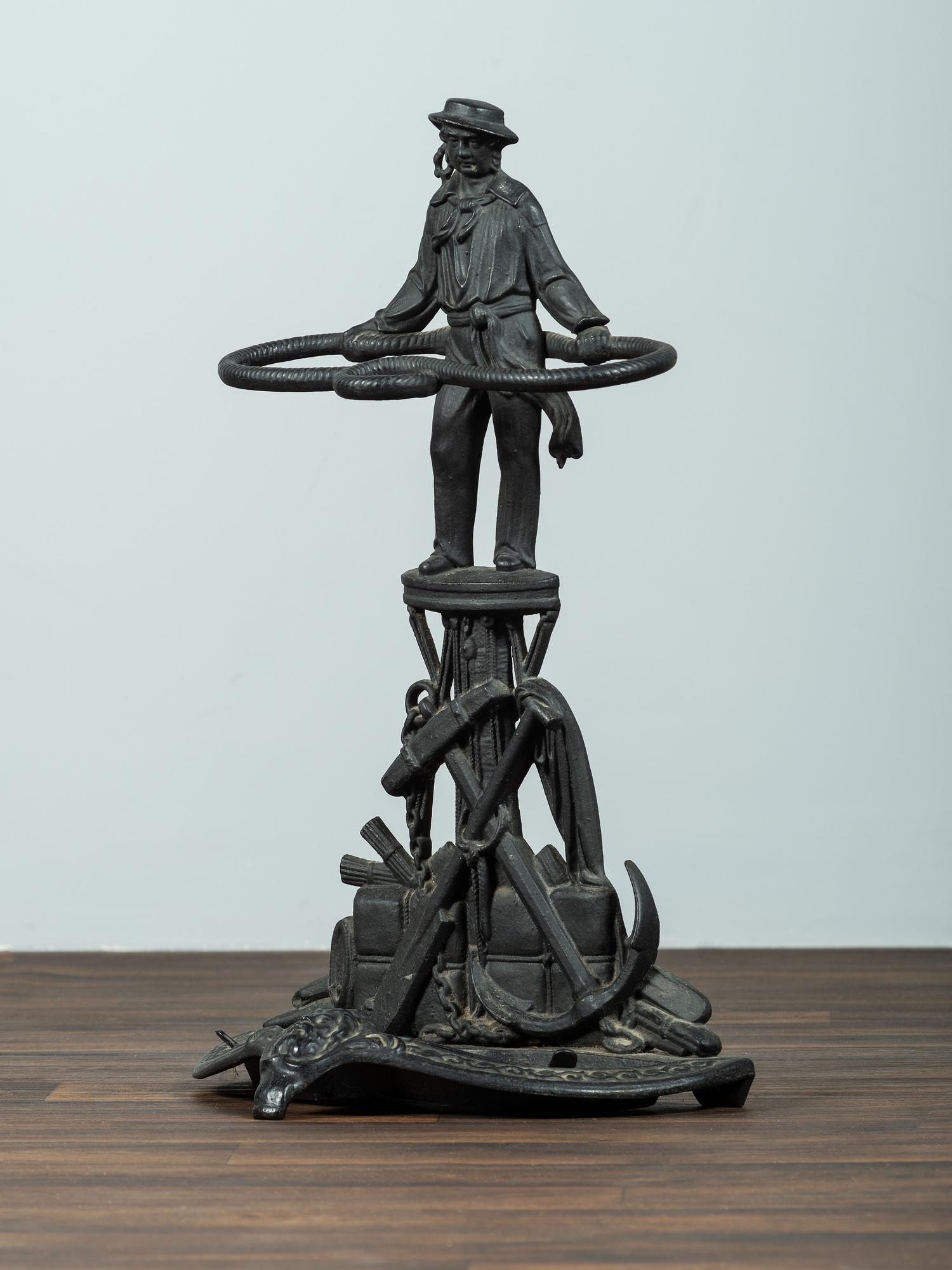 A Cast Iron Sailor Umbrella Stand