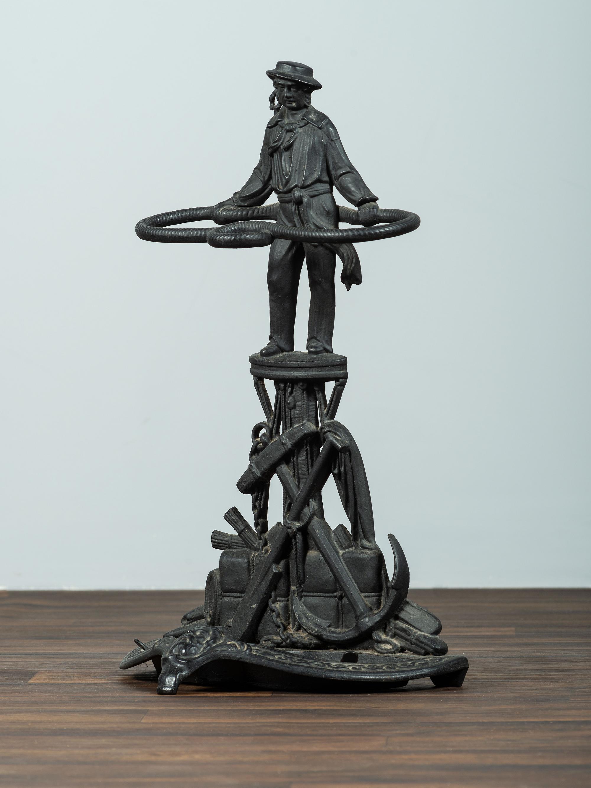 A Cast Iron Sailor Umbrella Stand