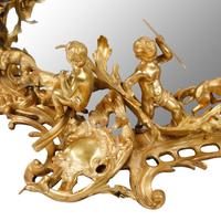 A Large Rococo Style Gilt and Patinated Bronze Surtout de Table