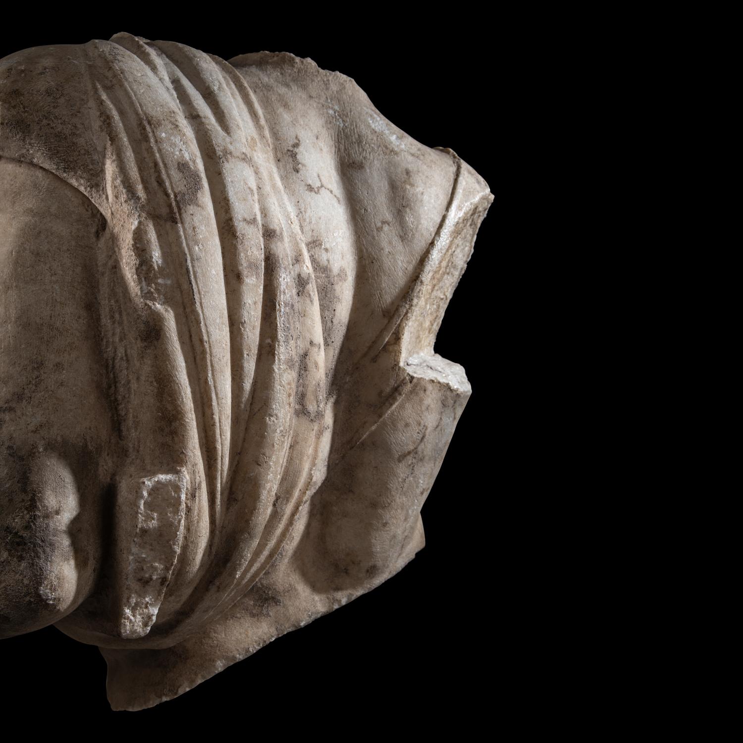 An Over-Lifesized Roman Marble Torso
