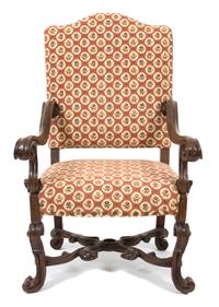 A Baroque Style Os de Mouton Carved Walnut Open Armchair Height 48 x width 30 x depth 28 inches. — 19TH CENTURY