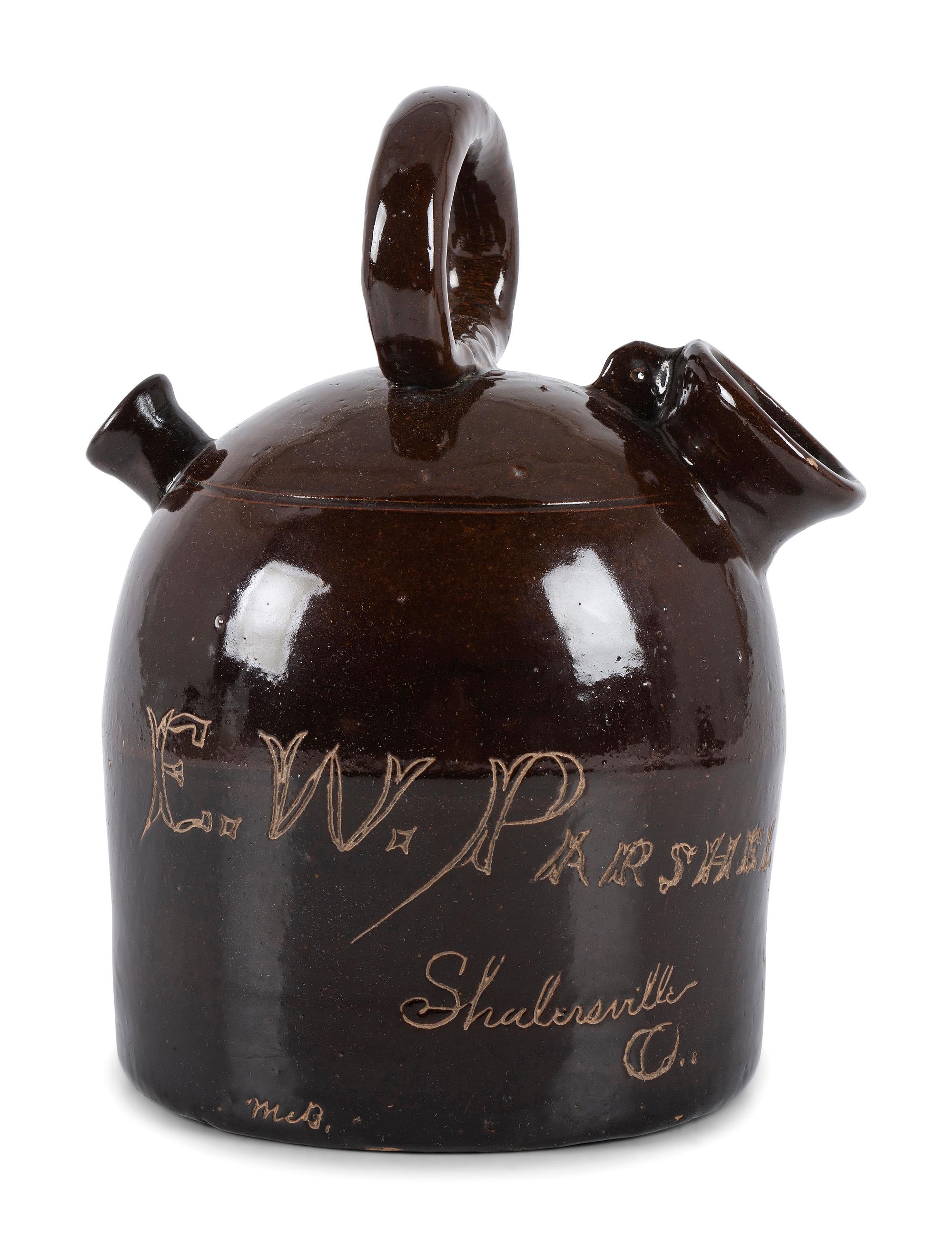 An Ohio Stoneware Albany Slip Harvest Jug
