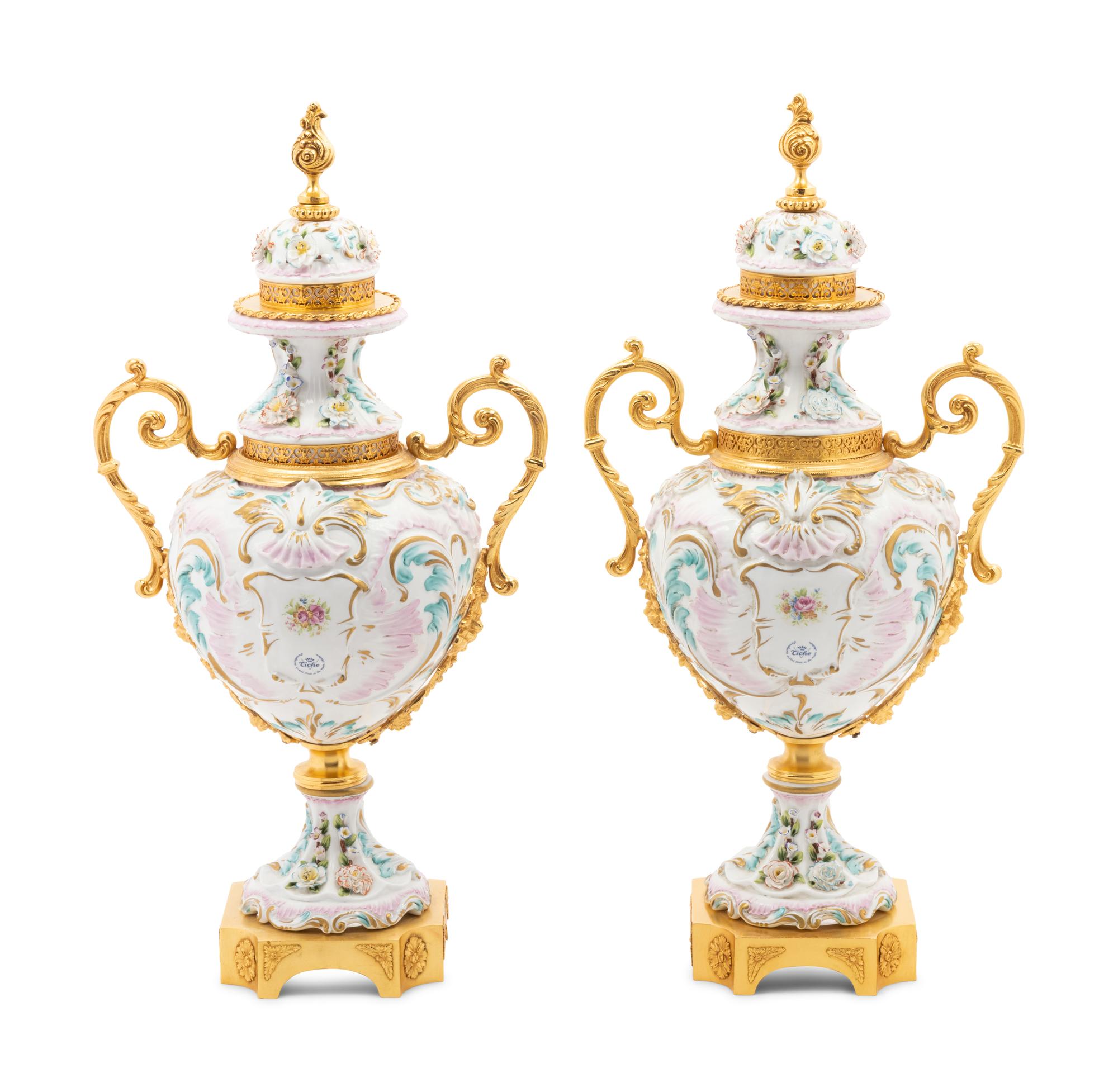 A Pair of Tiche Gilt Metal Mounted Porcelain Urns