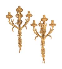A Pair of Louis XVI Style Gilt Bronze Three-Light Sconces