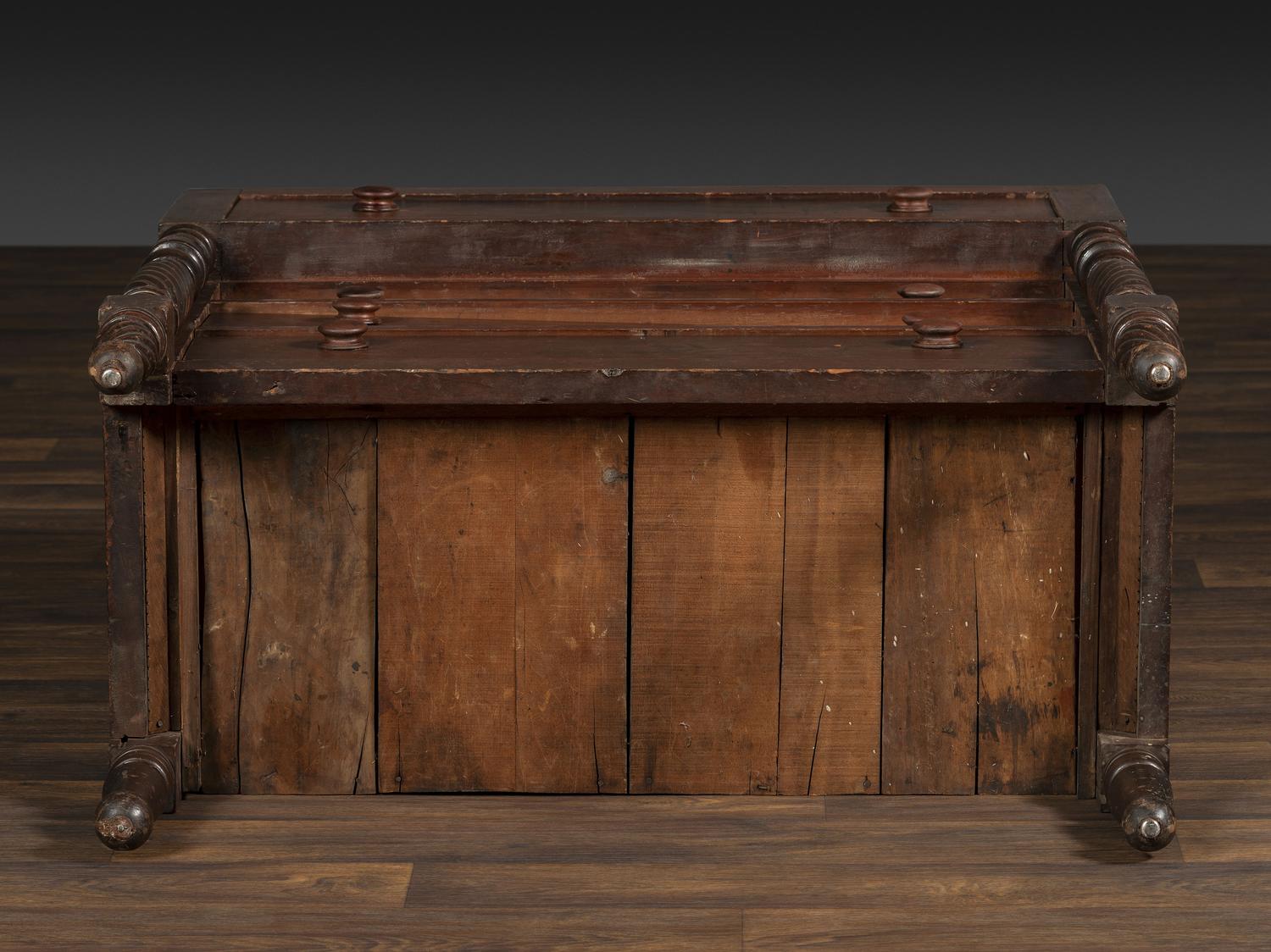 A Classical Tennessee Carved Cherrywood Chest of Drawers