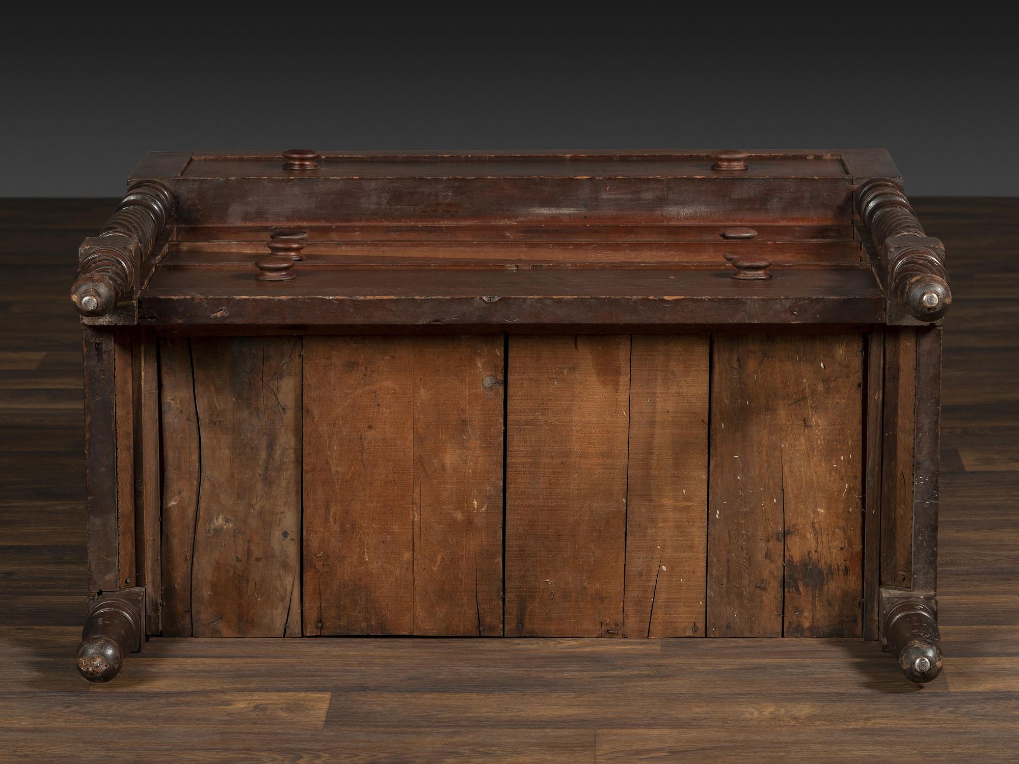 A Classical Tennessee Carved Cherrywood Chest of Drawers