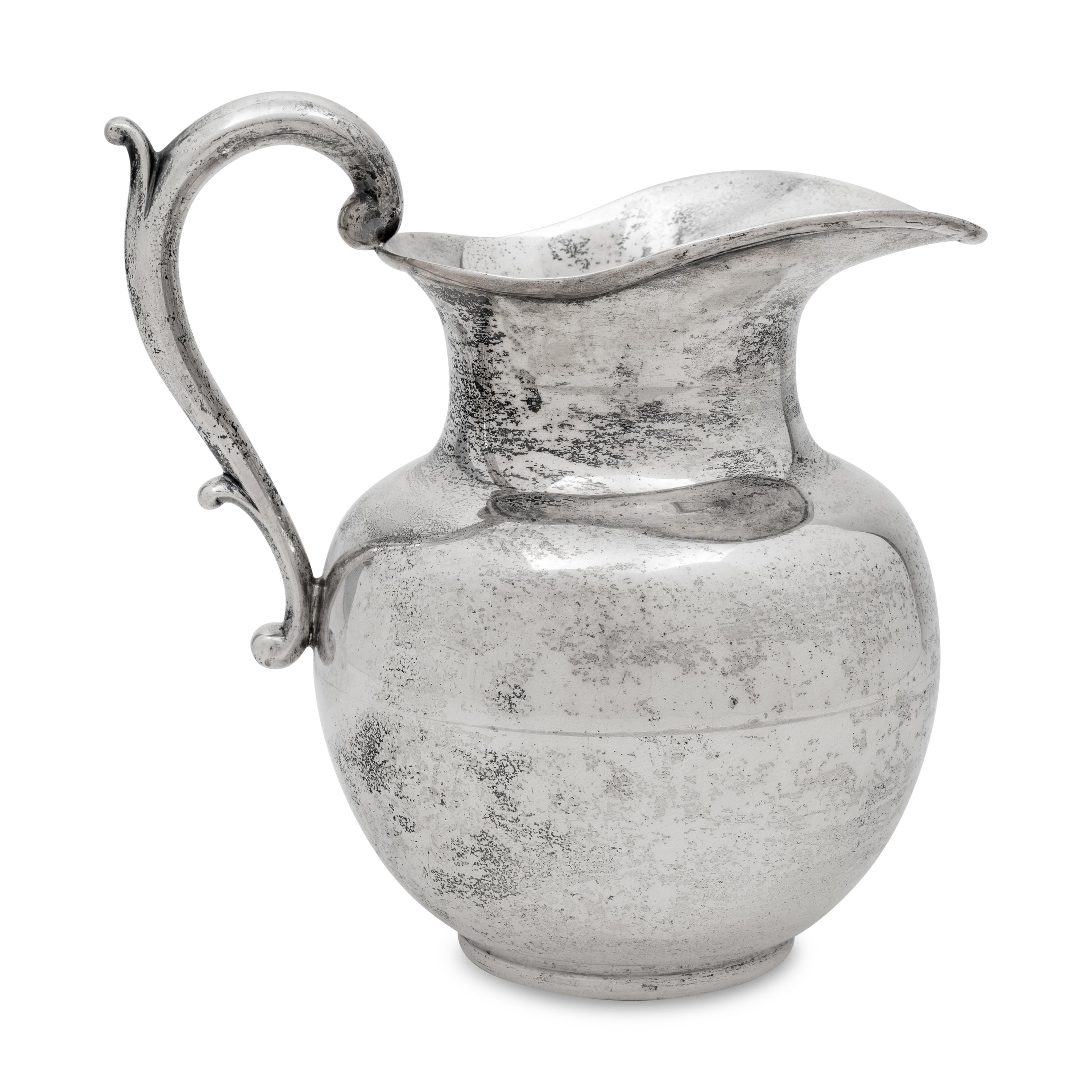 A Mexican Silver Water Pitcher