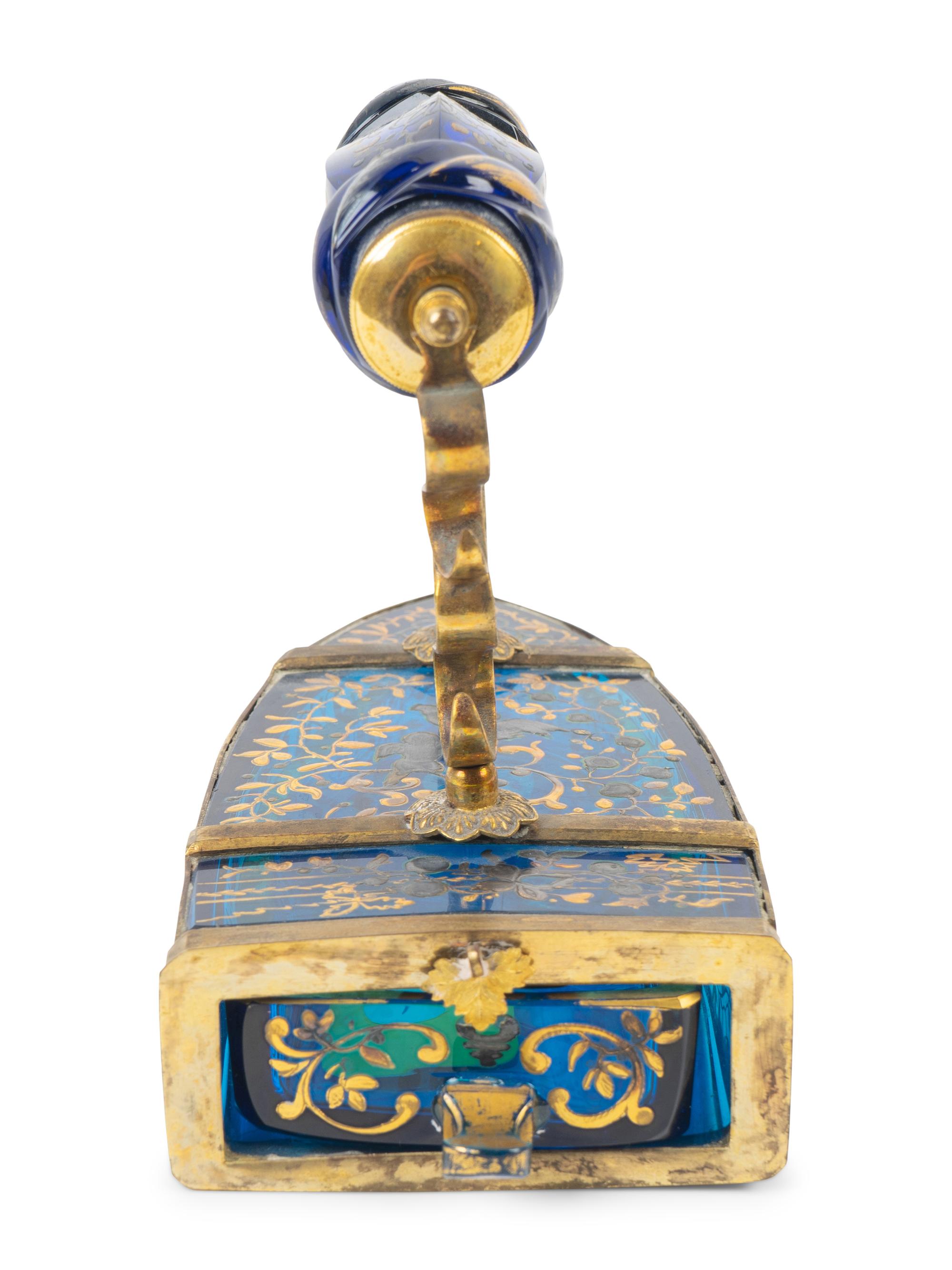 A Continental Brass-Mounted and Gilt-Decorated Blue Glass Iron-Form Box — LATE 19TH CENTURY
